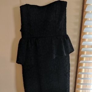 Strapless black lace peplum dress